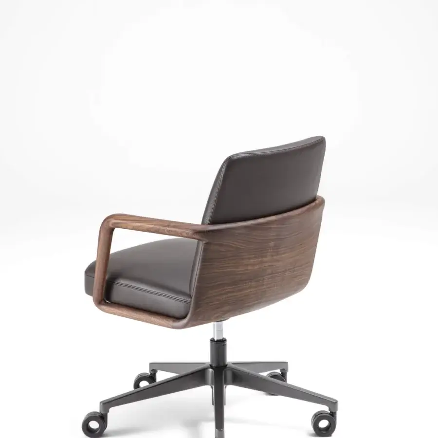 Distinguished Porada Cuna swivel chair crafted with sculpted solid Canaletta walnut and charcoal gray textile upholstery in satin finish