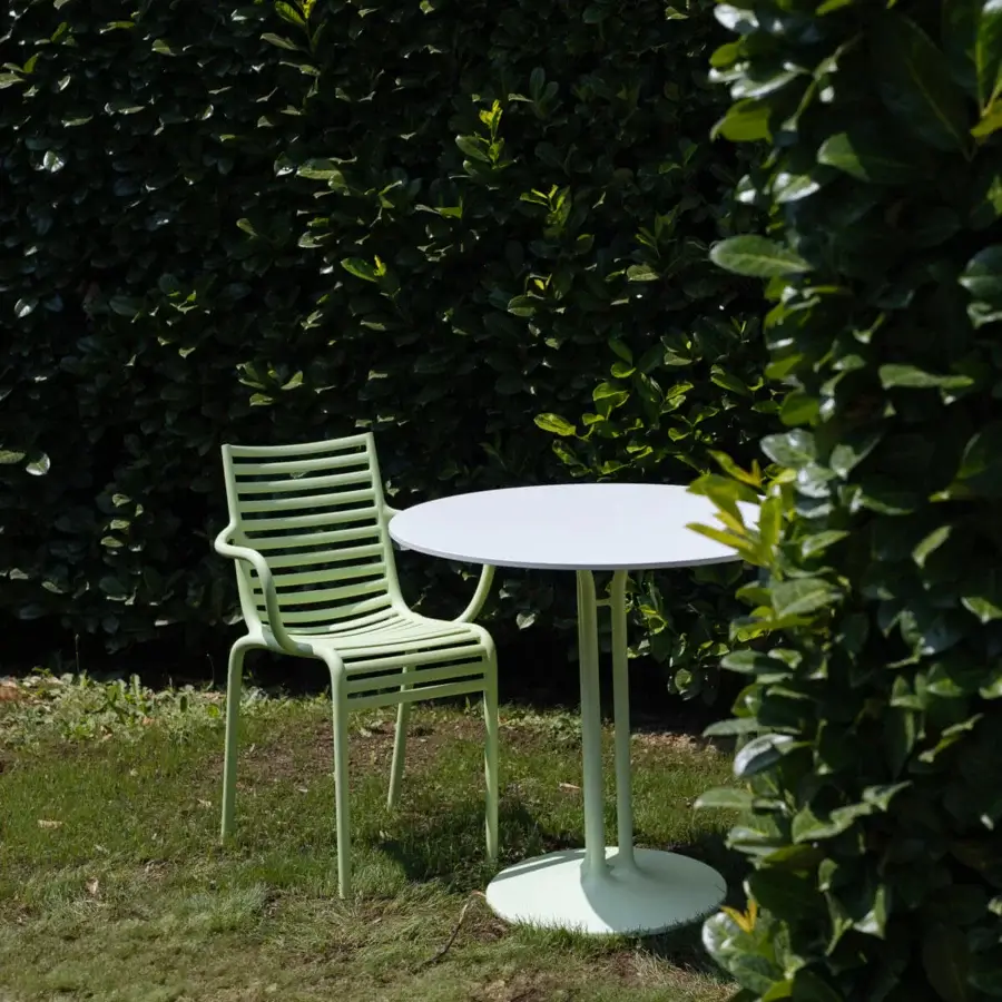 Elegant Driade Pip-e chair built in pale green polypropylene with a matte finish and horizontal slat design