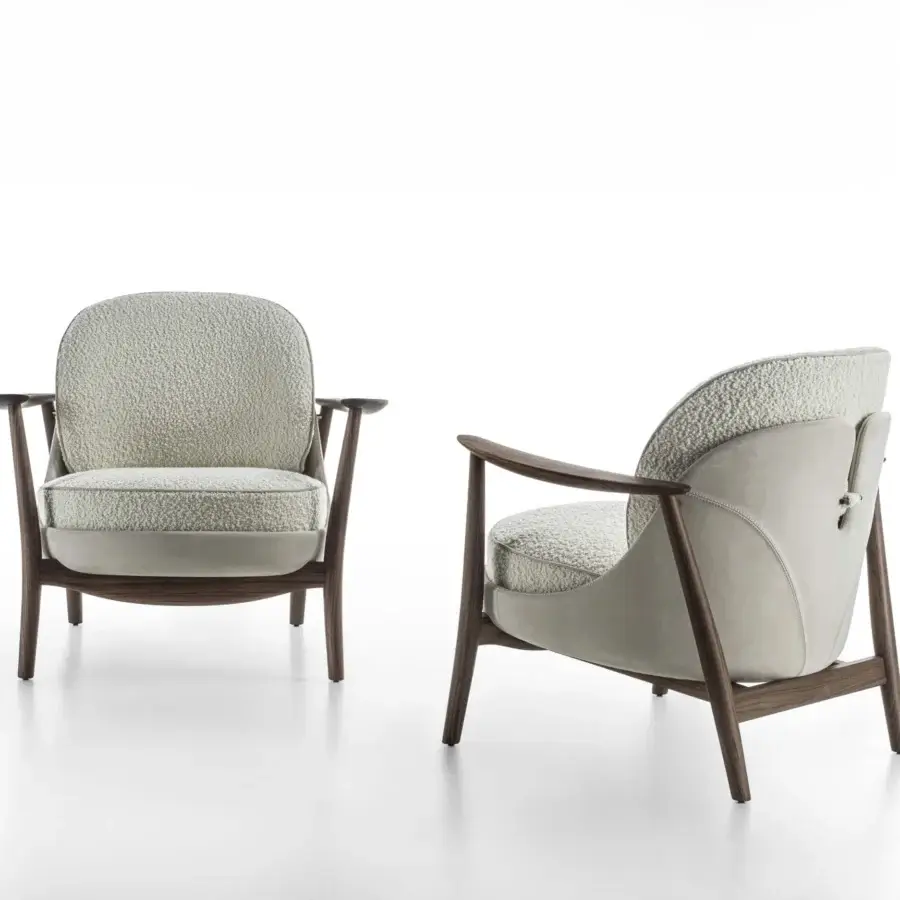 Superior Porada Ginkgo XL lounge chair with light grey bouclé fabric and a solid Canaletta walnut frame