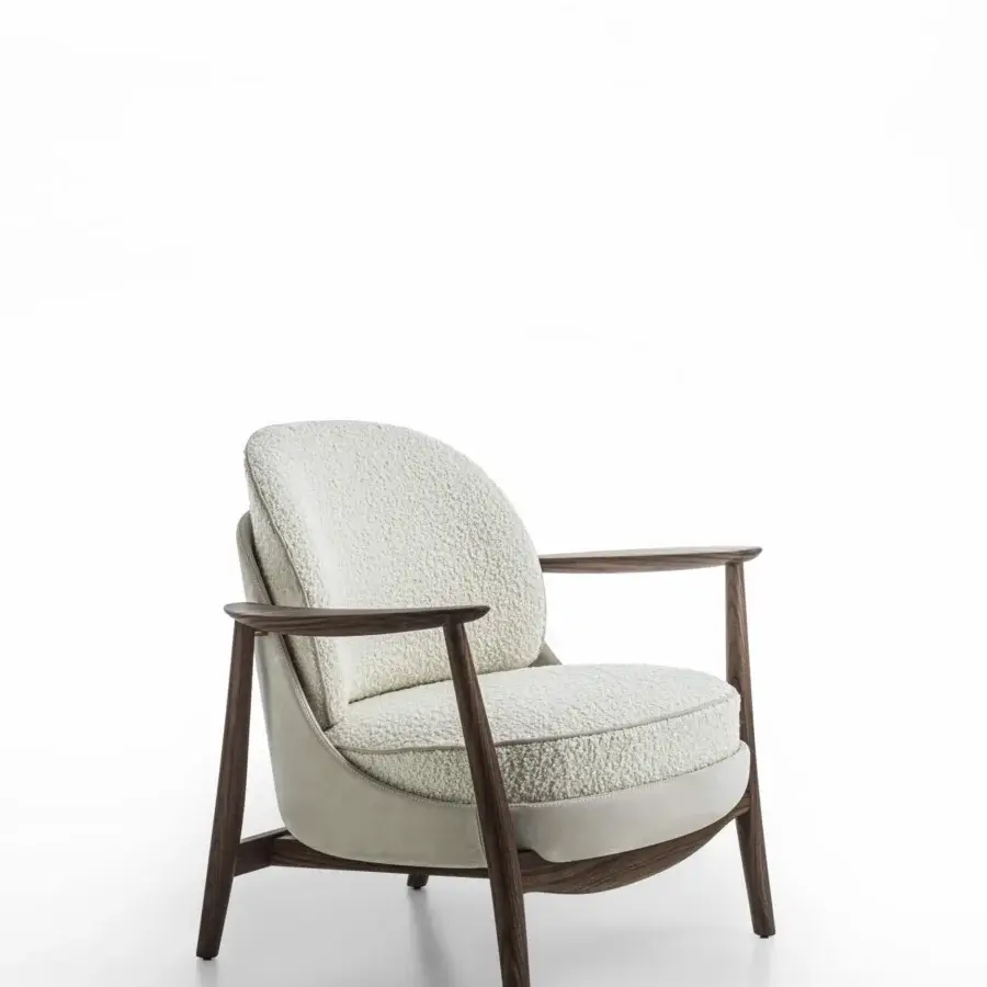 Exceptional Porada Ginkgo XL lounge chair with Canaletta walnut frame and textured off-white bouclé upholstery crafted with piping detail