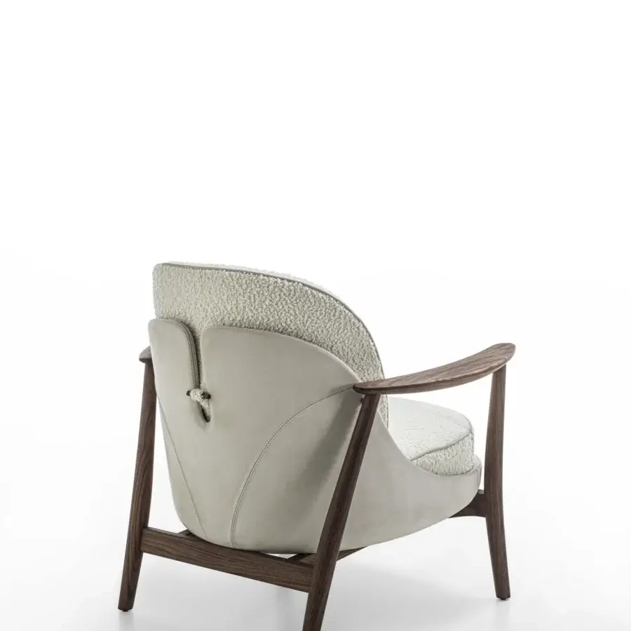 Superior Porada Ginkgo XL lounge chair with solid Canaletta walnut frame and light beige textile upholstery with leather detailing