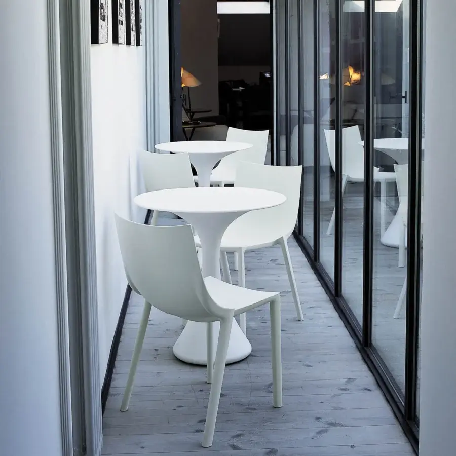 Distinctive Driade Bo chair with fluid sculptural silhouette crafted in durable technopolymer and smooth matte white finish