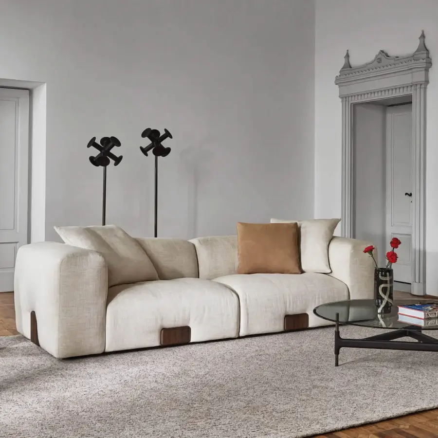 Exceptional Porada Koji sofa with low wide organically shaped form upholstered in off-white woven fabric and Canaletta walnut base
