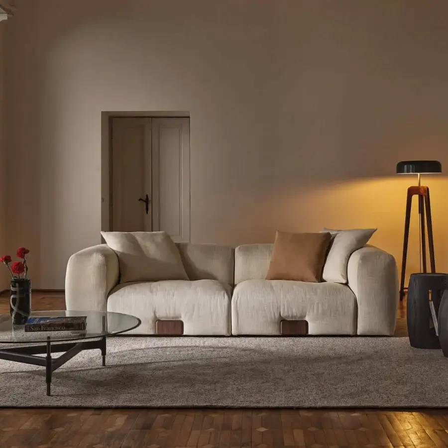 Architectural Porada Koji sofa with light beige textile upholstery and distinctive Canaletta walnut detailing