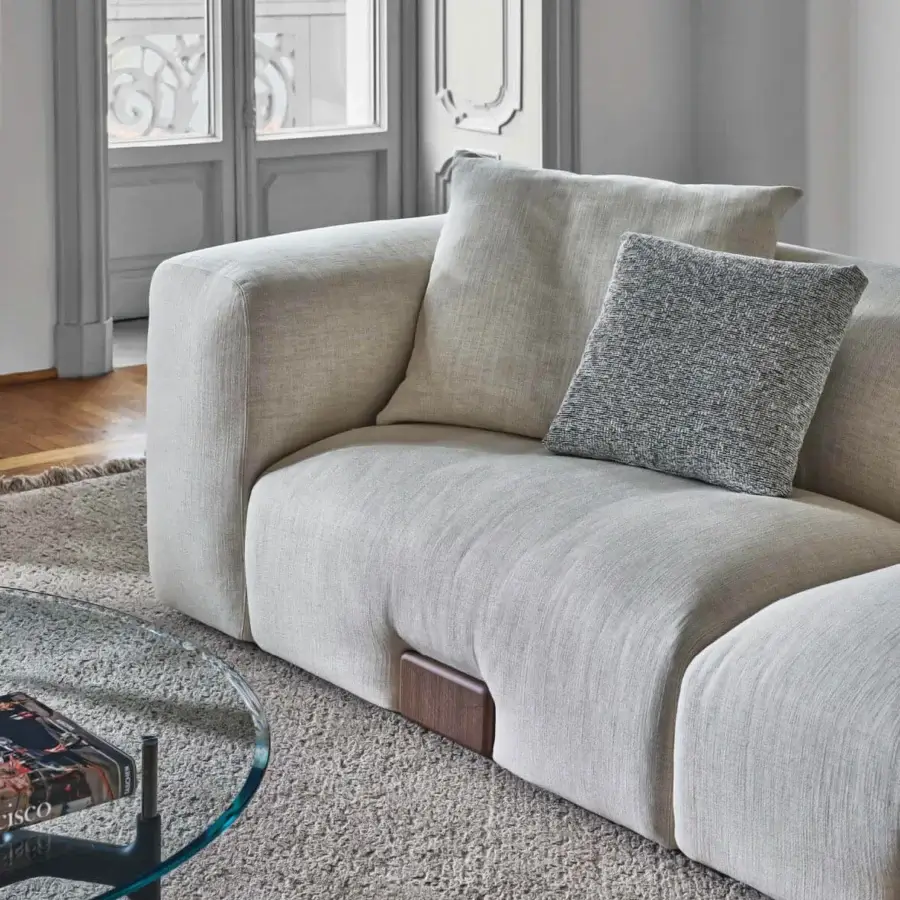 Exceptional Porada Koji sofa with light neutral gray textured textile upholstery and Canaletta walnut detail