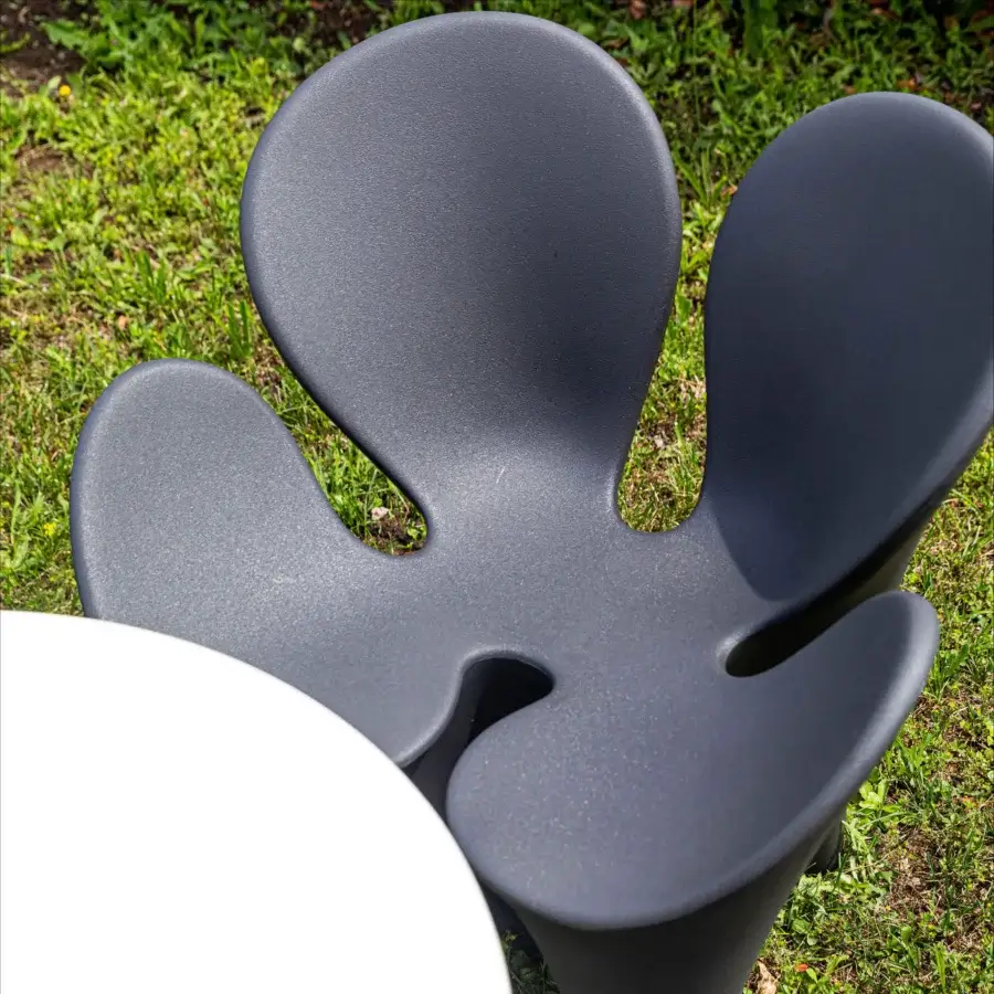 Distinguished Driade Clover armchair with organically-shaped form in anthracite black polyethylene and matte finish