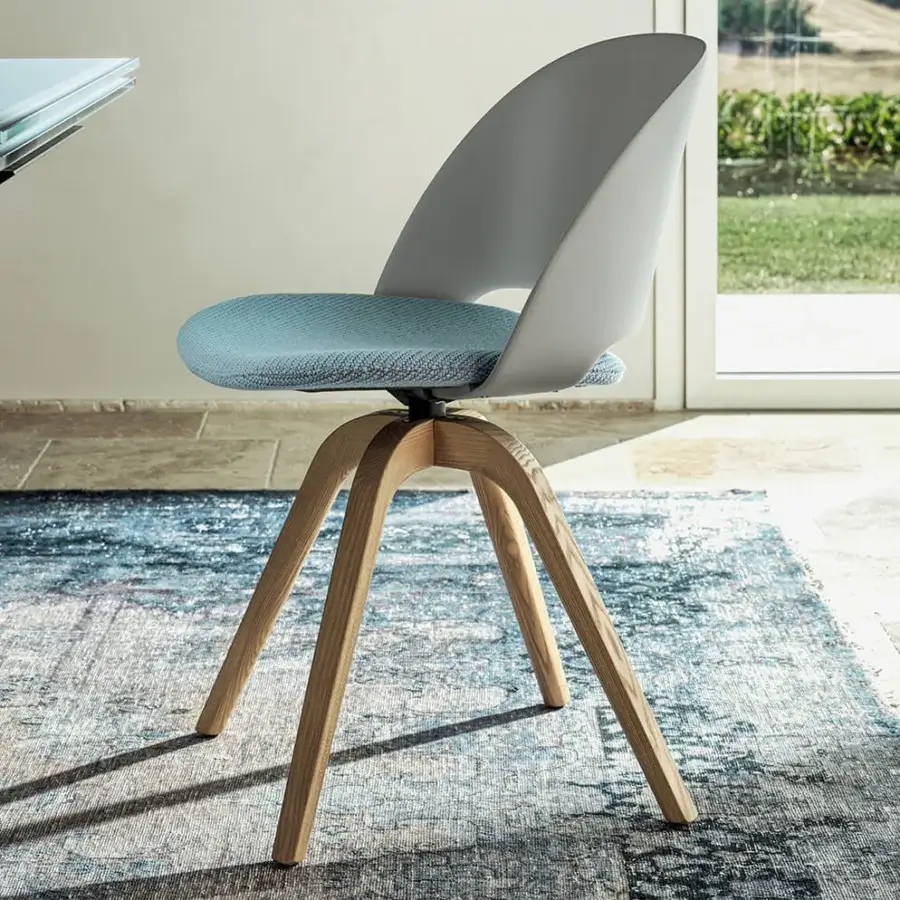 Superior Bontempi Polo chair with gently curved form and light blue textured seat in satin-finish light wood and matte gray shell