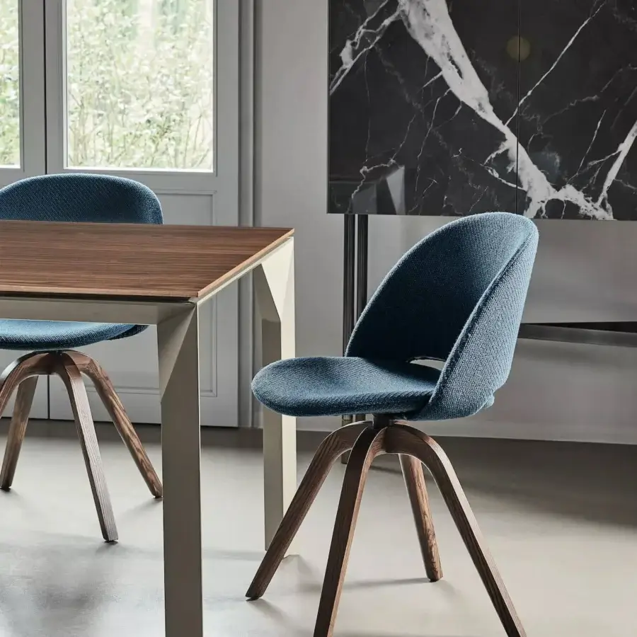 Elegant Bontempi Polo chair with muted blue textured textile upholstery and satin-finish solid wood star base