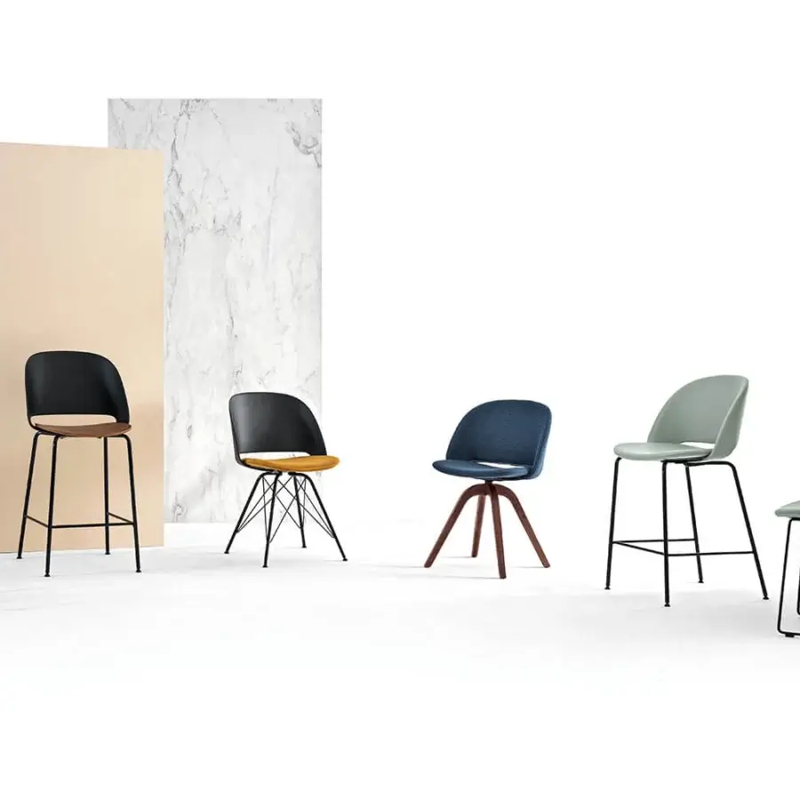 Architectural Bontempi Polo chair with teal molded synthetic material and sleek matte black metal frame