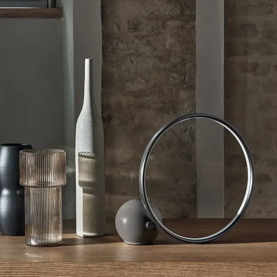 Distinguished Bontempi Circle lamp crafted in Italy with a matte gray base and clear glass reflector framed in satin charcoal gray metal