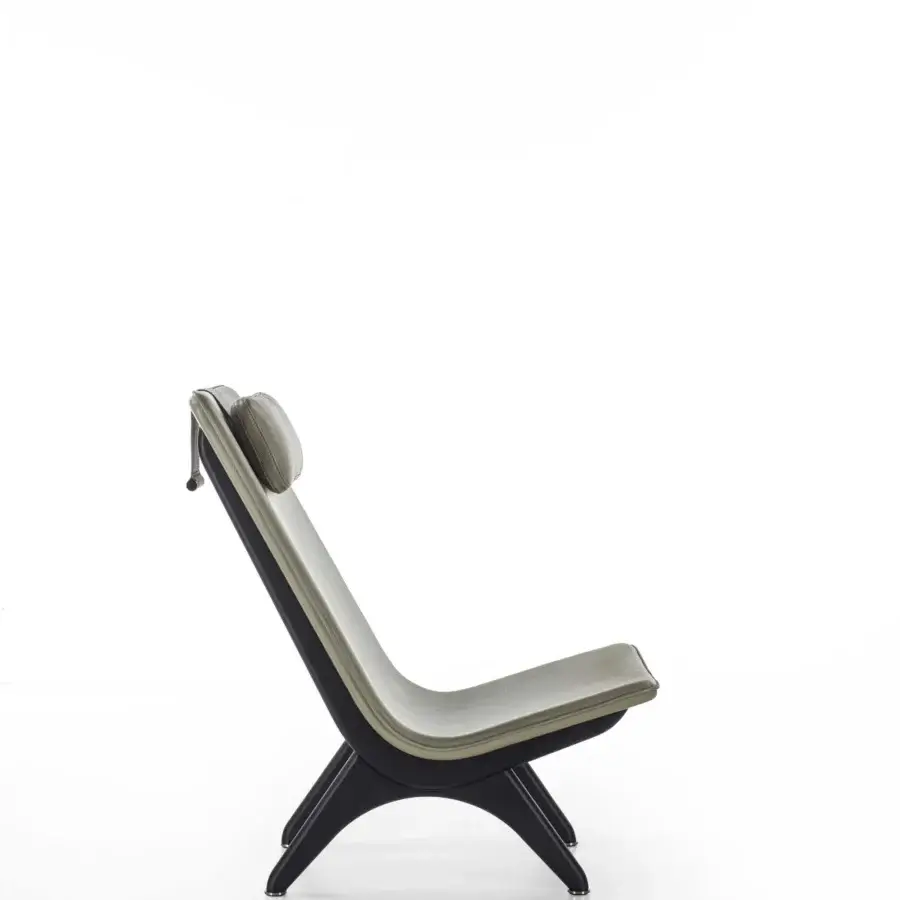 Distinguished Porada Koko lounge chair with Canaletta walnut frame and muted grey-green textile upholstery in satin finish
