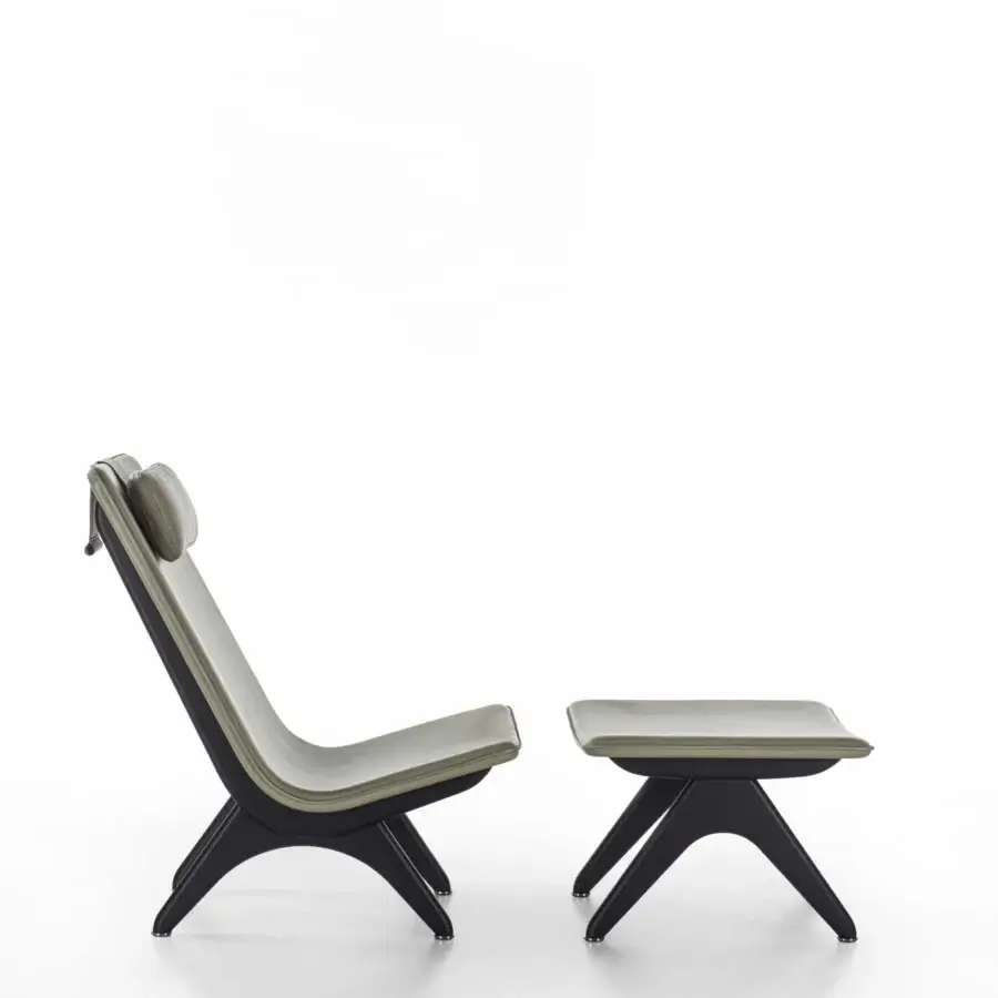Superior Porada Koko lounge chair with Canaletta walnut structure and subtly textured gray fabric upholstery