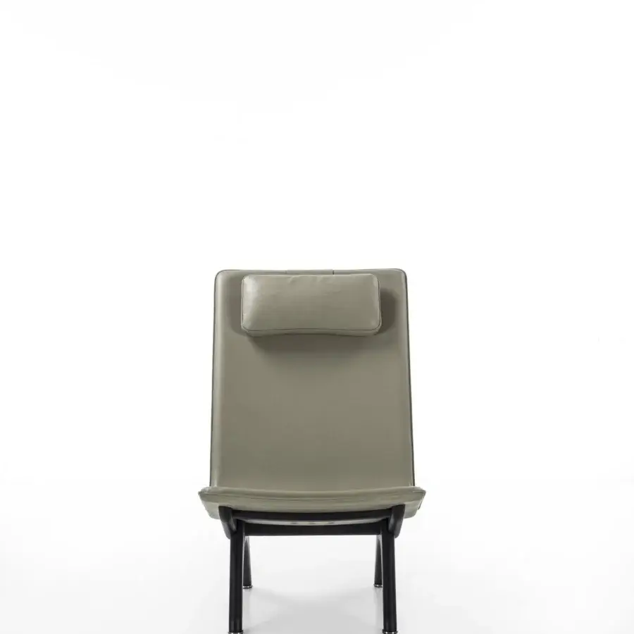 Distinguished Porada Koko lounge chair with Canaletta walnut frame and muted olive green textile upholstery with black chrome details