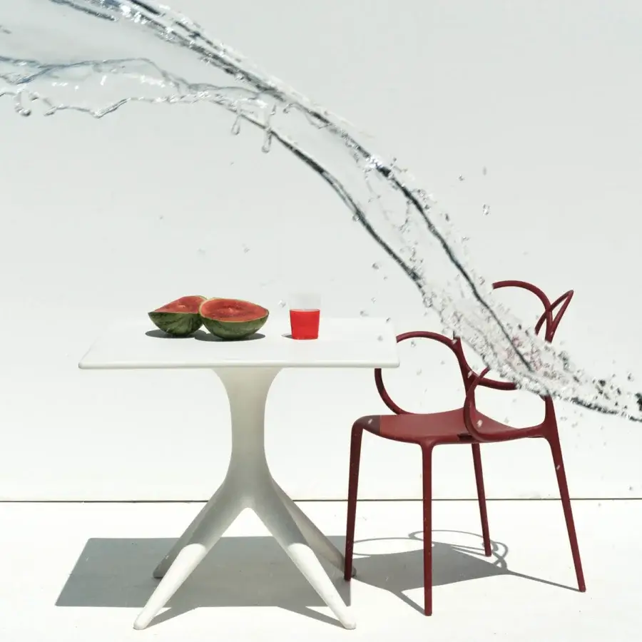 Elegant Driade Sissi chair molded in reddish-burgundy polypropylene copolymer reinforced with glass fiber and glossy finish