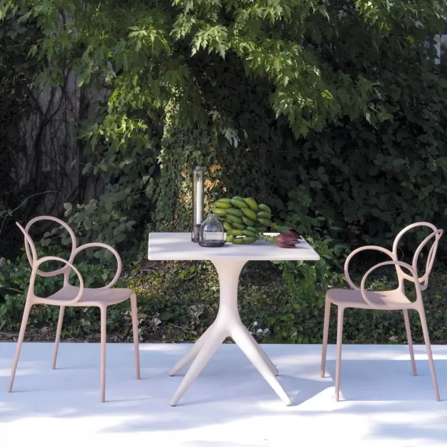 Distinctive Driade Sissi chair crafted in dusty rose polypropylene copolymer reinforced with glass fiber and a smooth matte finish