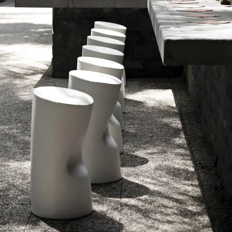 Distinctive Driade Tokyo-Pop stool sculpted from durable polyethylene with a smooth matte white finish and playfully curved form