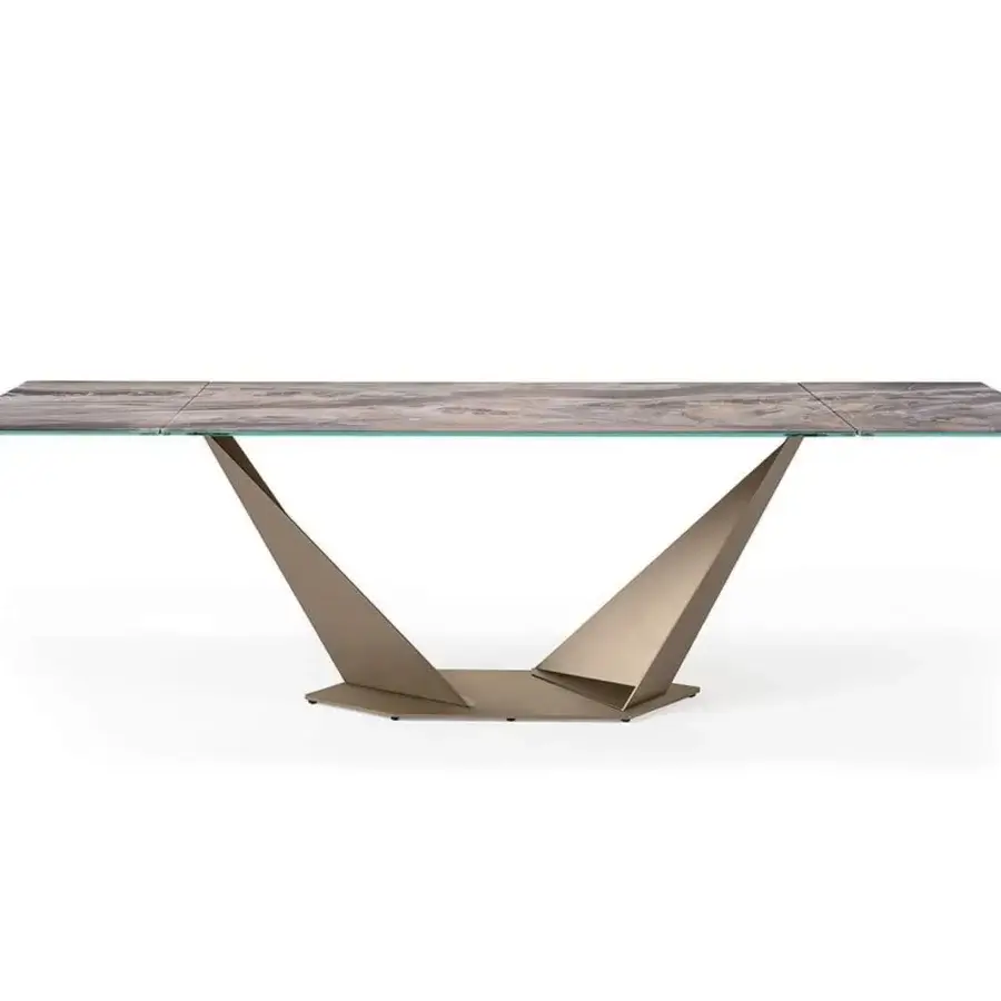 Distinguished Reflex Quartz table with a stone-like pattern in neutral tones and a satin bronze metal base