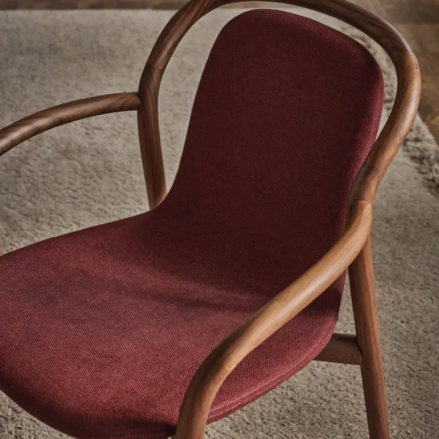 Exceptional Porada Petra chair built in solid Canaletta walnut with upholstered seat and satin wood finish