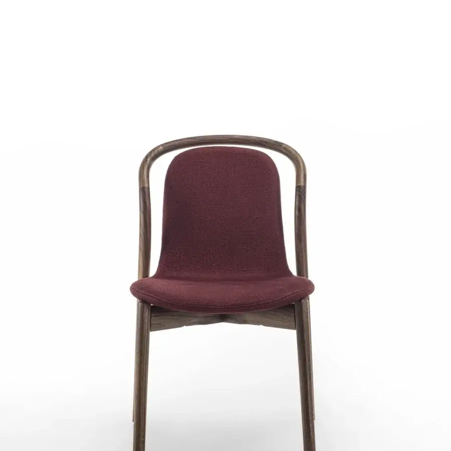 Exceptional Porada Petra chair with solid Canaletta walnut frame and muted burgundy textured upholstery offering balanced design