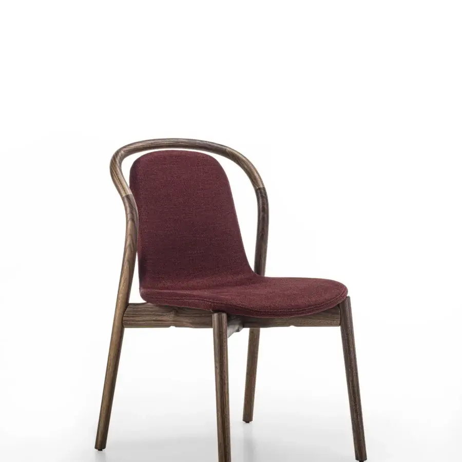Superior Porada Petra chair with solid Canaletta walnut frame and deep burgundy textured textile upholstery with satin finish