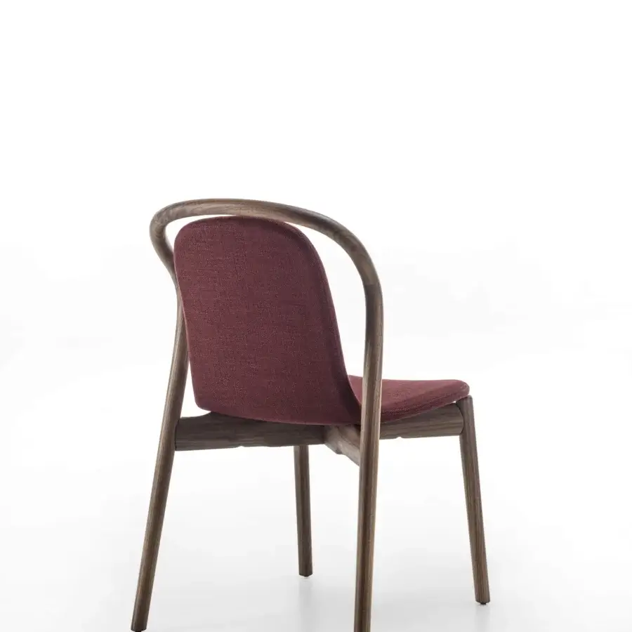 Distinguished Porada Petra chair crafted with solid Canaletta walnut and reddish-brown upholstery in a satin finish