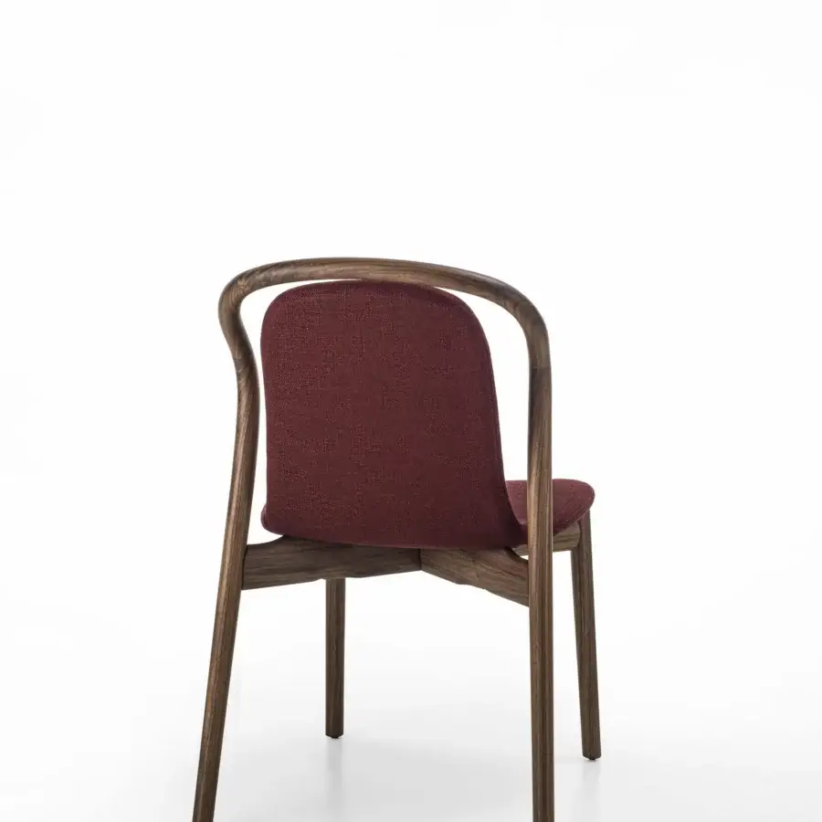 Exceptional Porada Petra chair with solid Canaletta walnut frame and deep burgundy upholstery in satin finish