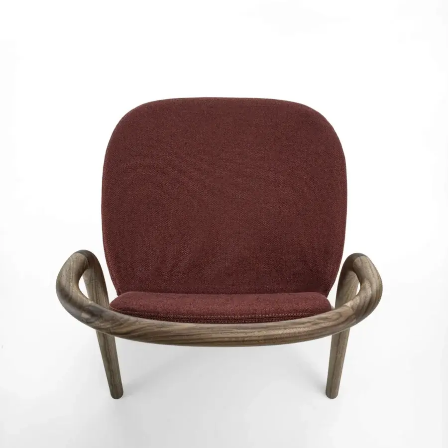 Superior Porada Petra chair with solid Canaletta walnut frame and beautifully upholstered deep burgundy textile