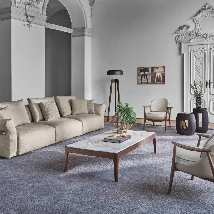 Distinguished Porada Ronny sofa crafted in Italy with textured neutral beige textile and refined medium-tone wood base