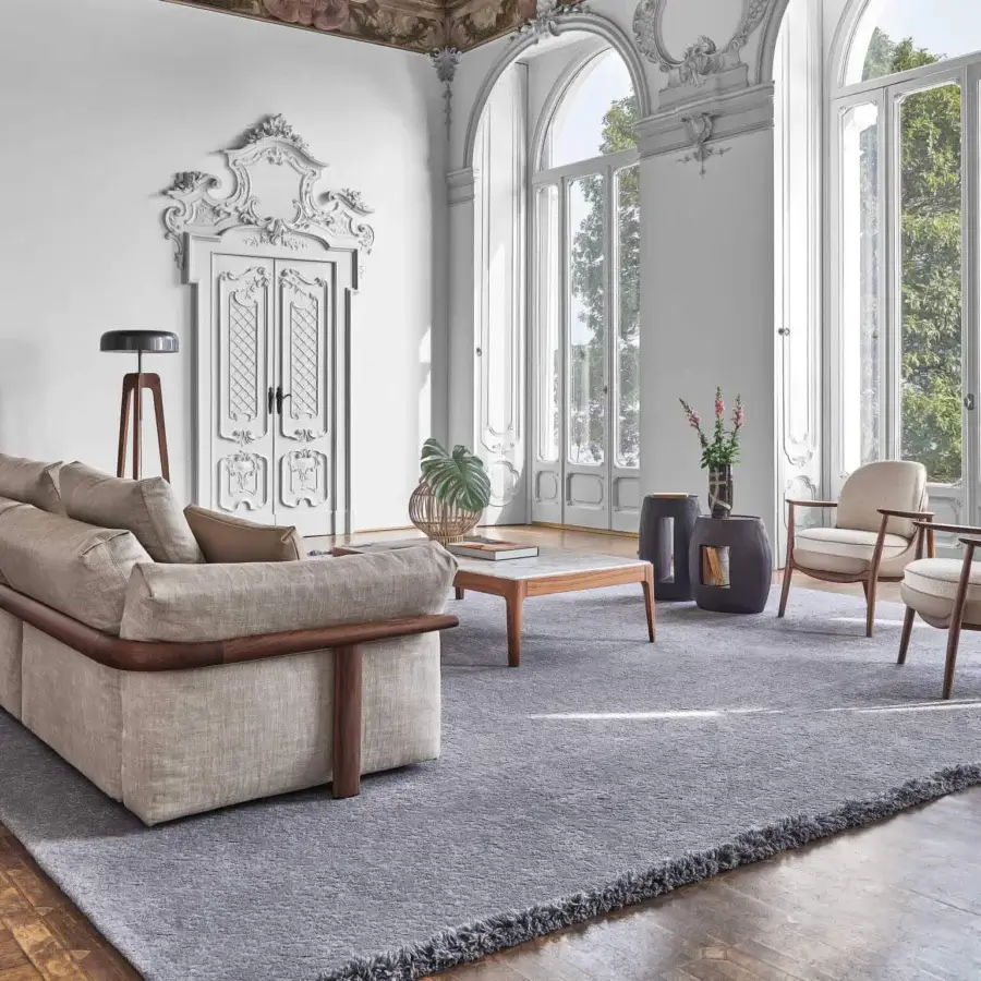 Exceptional Porada Ronny sofa crafted with multilayer wood and textured neutral beige textile in satin medium-tone brown finish