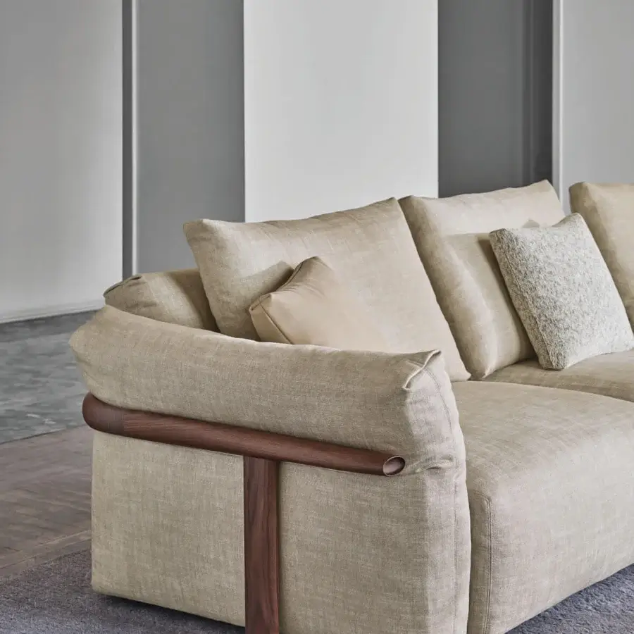 Distinguished Porada Ronny sofa crafted in Italy with textured beige textile and satin finished wooden frame