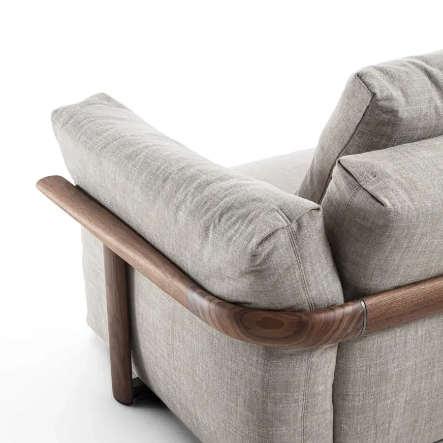 Distinguished Porada Ronny sofa with sculpted form, plush cushions upholstered in textured gray-beige textile and satin finish wood