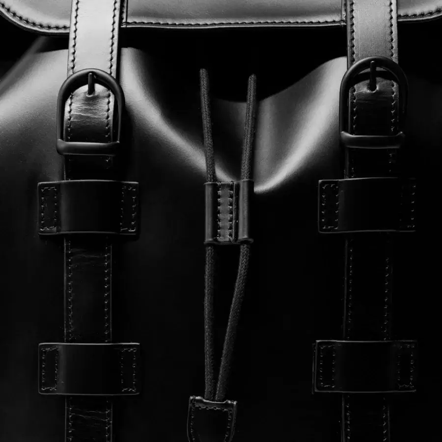 Elegant Mascheroni Biggie backpack crafted in Italy from smooth black leather with a sleek rectangular silhouette