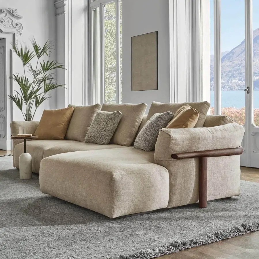 Distinguished Porada Ronny sectional with neutral beige textile upholstery and light-toned wood armrests built with multilayer wood frame