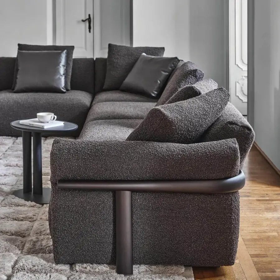 Exceptional Porada Ronny sectional with dark muted gray textile upholstery and dark leather cushions crafted in wood frames