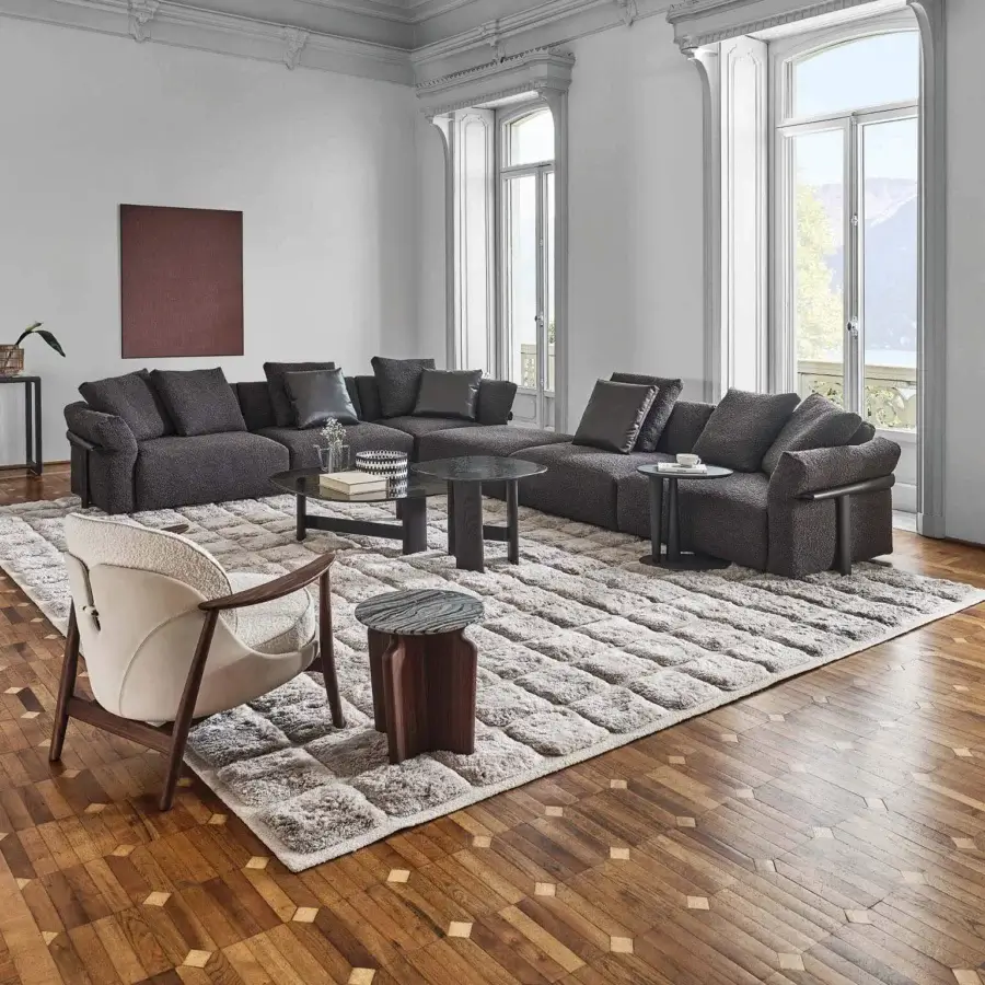 Superior Porada Ronny sectional with medium gray textured fabric upholstery and quilted goose down construction