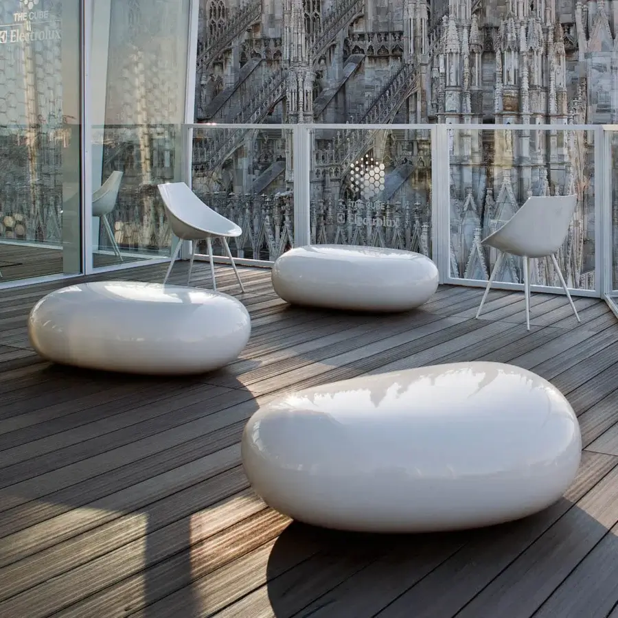 Elegant Driade Koishi ottoman crafted from painted fiberglass with glossy finish and curved lines