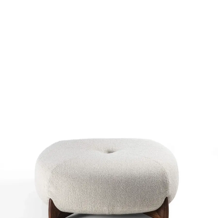 Elegant Porada Softbay ottoman with creamy off-white bouclé upholstery and criss-cross stitching built with birch plywood and fir