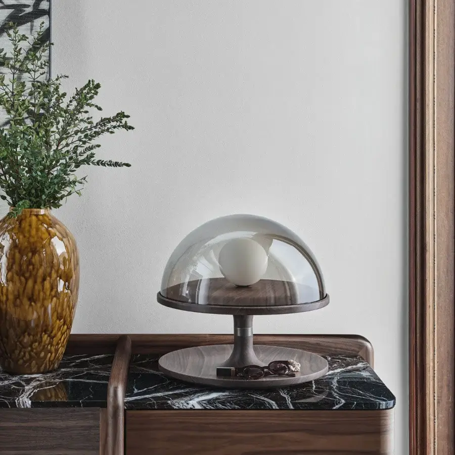 Exceptional Porada Tack table lamp crafted in Canaletta walnut with brushed bronzed brass and clear smoked transparent glass diffuser