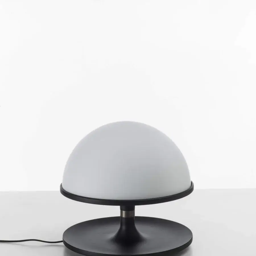 Distinguished Porada Tack table lamp crafted in Canaletta walnut with brushed bronzed brass and white opaline glass diffuser with matte dark finish