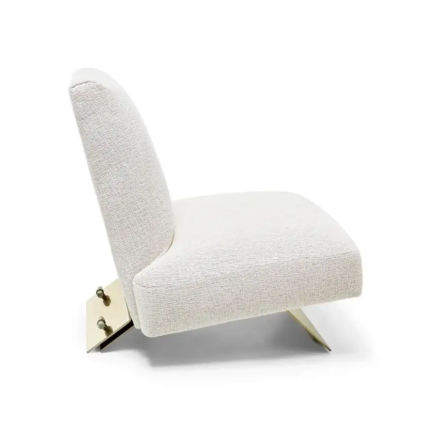 Distinguished Visionnaire Aries lounge chair upholstered in textured off-white fabric with polished golden metal and turned brass accents