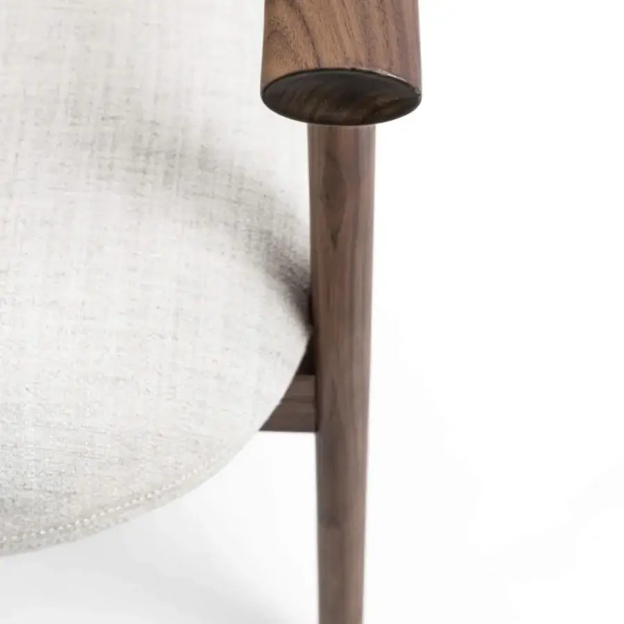 Superior Porada Teti chair crafted in solid wood with satin sheen and woven light beige fabric cushions