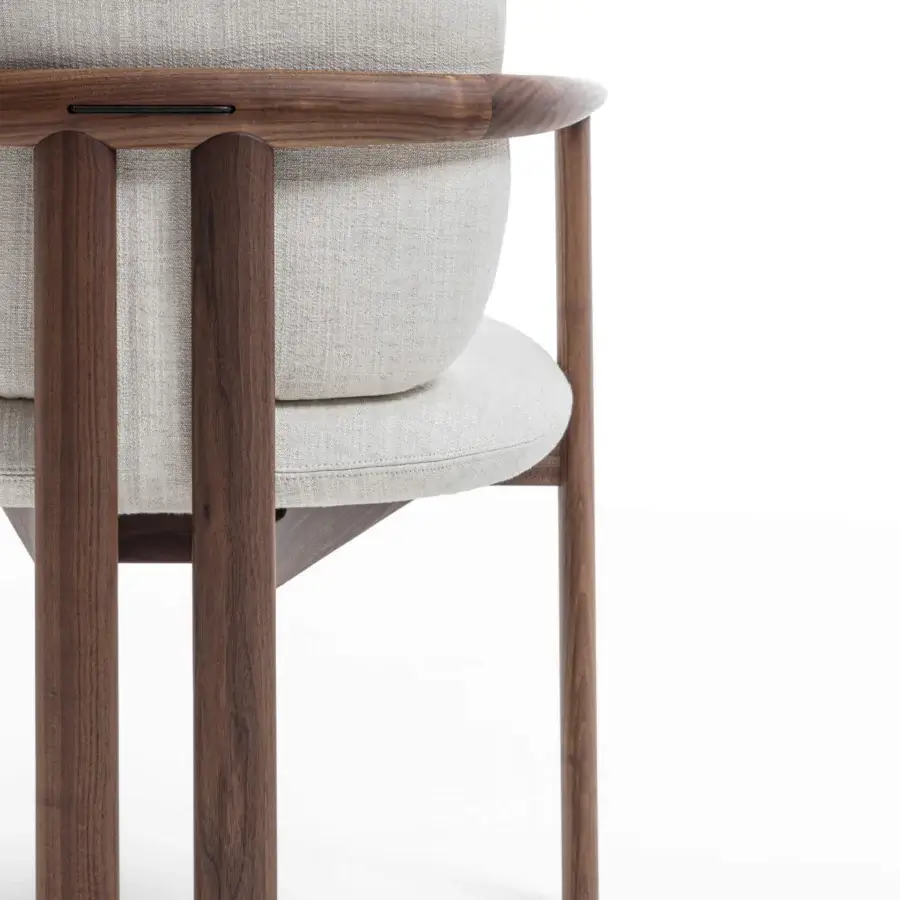 Elegant Porada Teti chair crafted in solid wood with satin finish and light gray upholstered cushions secured with saddle leather cord