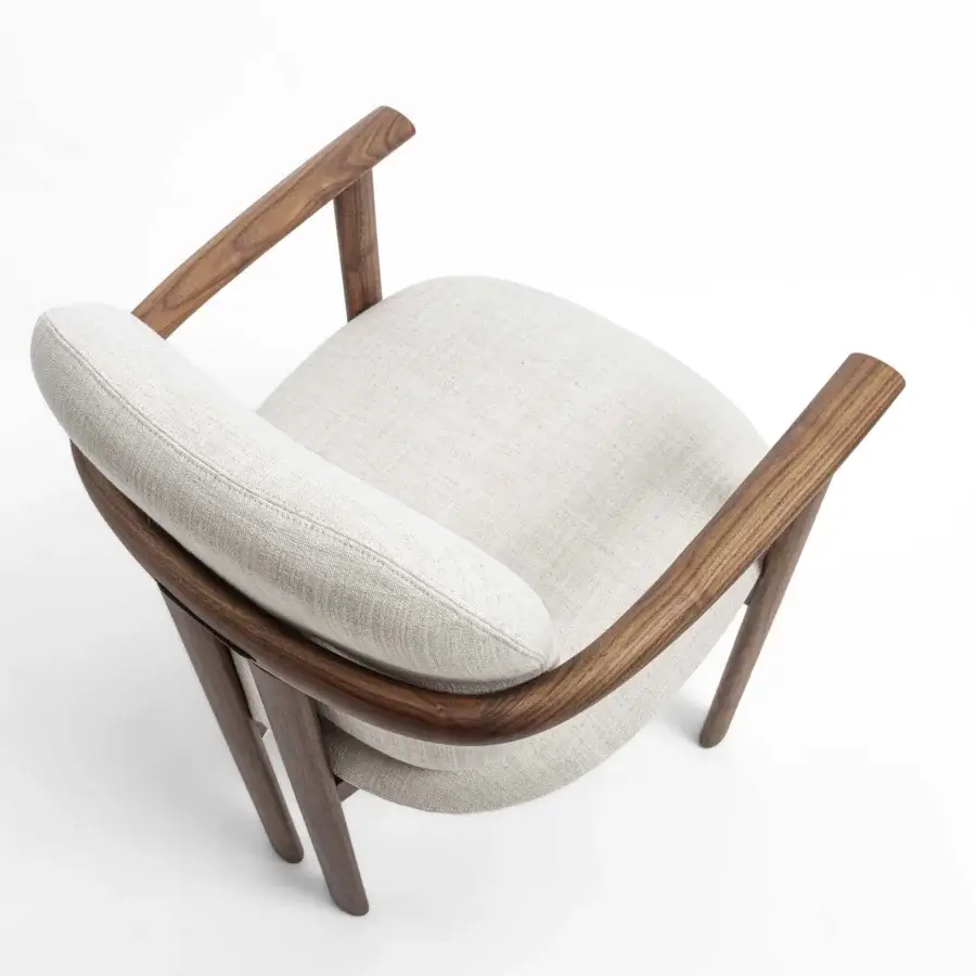 Superior Porada Teti chair crafted in medium-dark wood with satin finish and light beige textured upholstery secured with saddle leather cord
