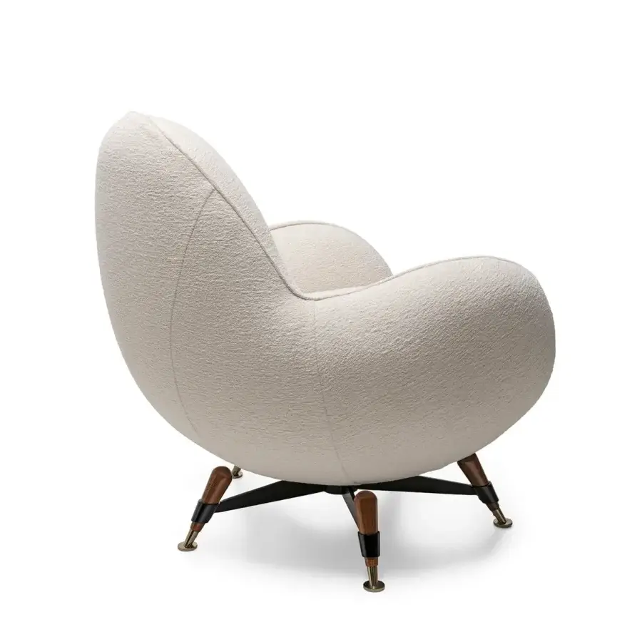 Elegant Visionnaire Mercury lounge chair with textured off-white fabric upholstery and a black steel base built with brass-lacquered wood feet