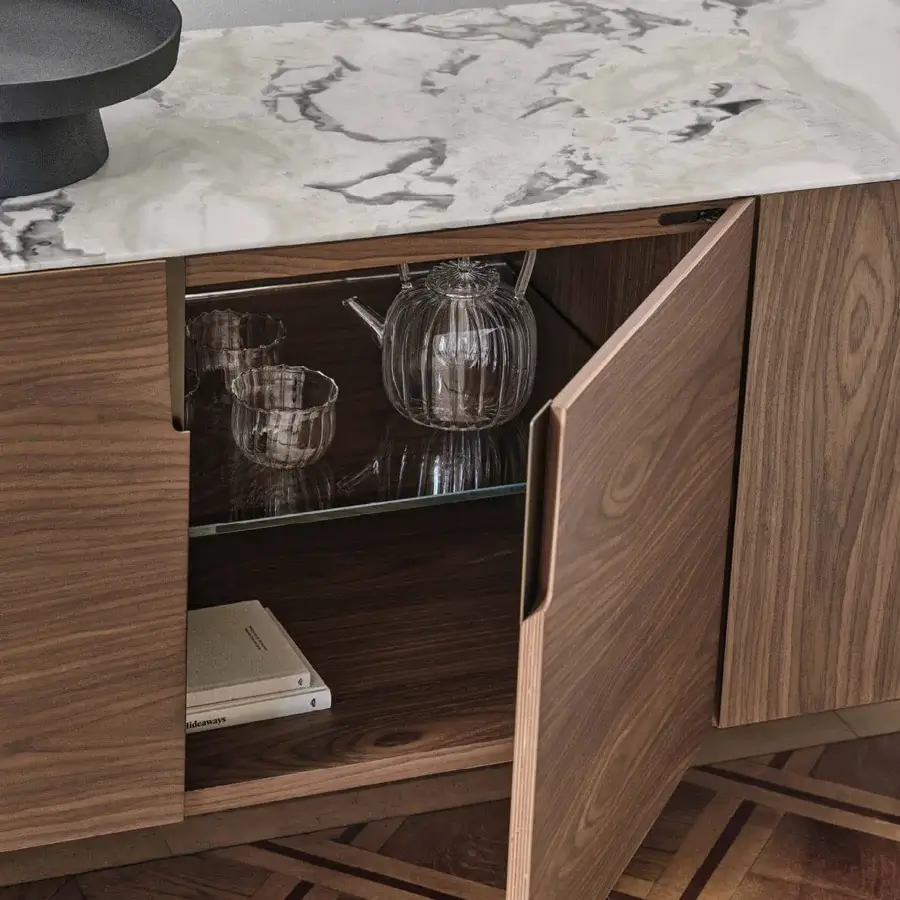 Distinguished Porada Tylsa sideboard built in solid Canaletta walnut with satin finish and a marble top featuring gray and white veining