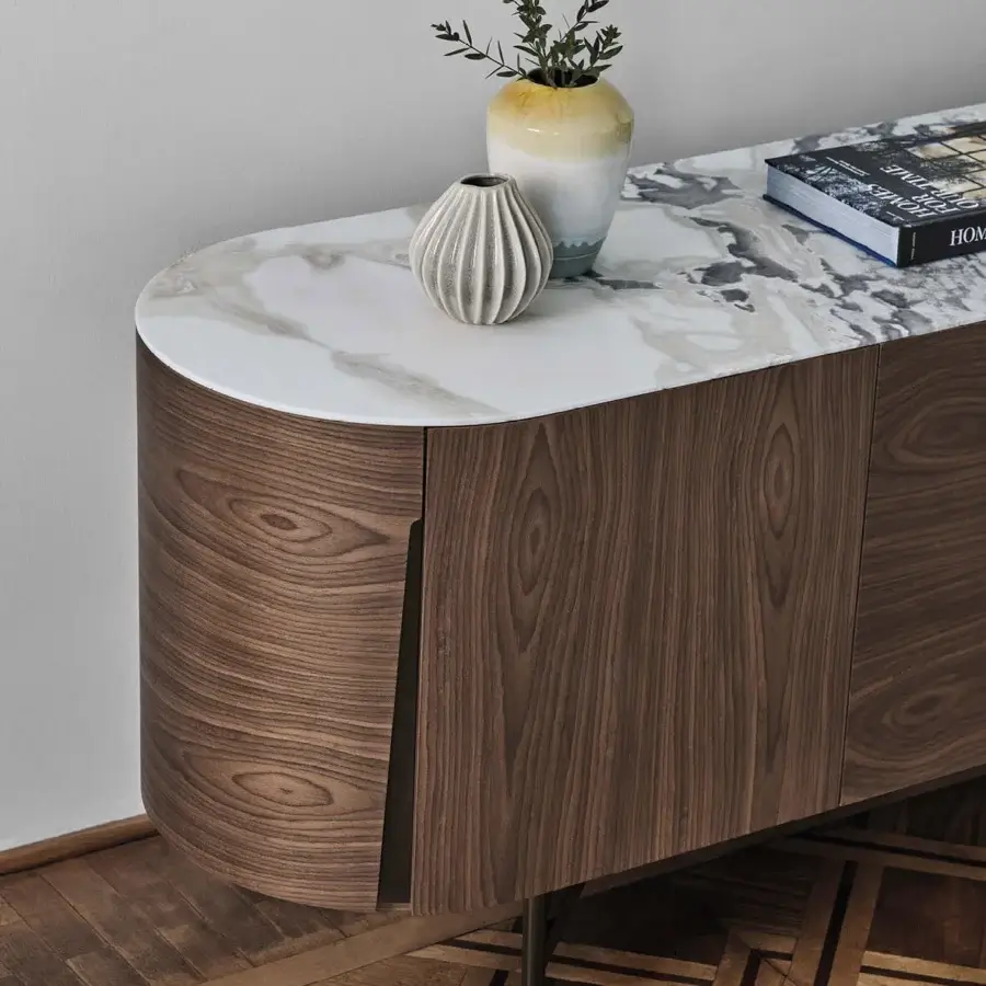 Exceptional Porada Tylsa sideboard crafted in solid Canaletta walnut with white and gray marbled top and satin finish