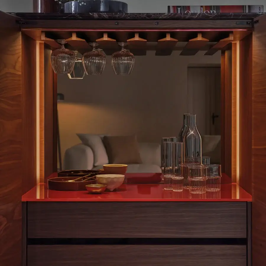 Distinguished Porada Tylsa bar cabinet built in Canaletta walnut with satin finish and Cuoietto leather drawers