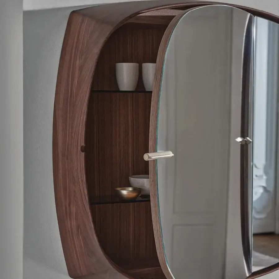 Distinguished Porada Vico mirror crafted in Canaletta walnut with satin finish, smoked glass shelves and Cuoietto Sabbia leather handles