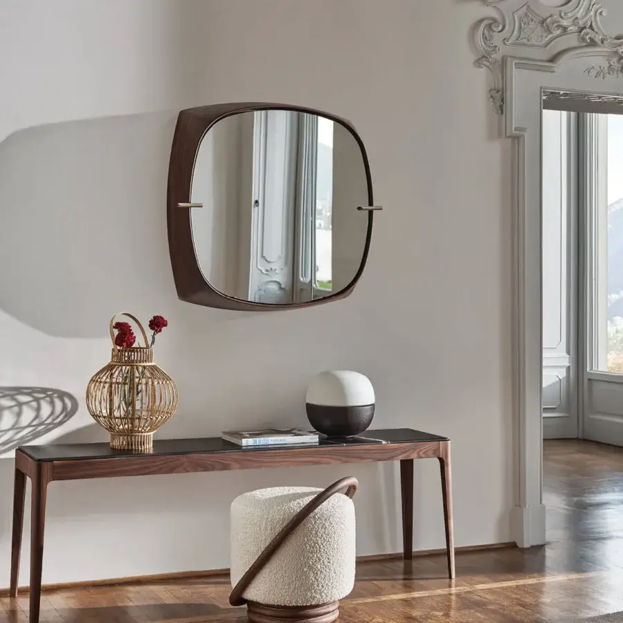 Exceptional Porada Vico mirror crafted in Canaletta walnut with satin finish, integrated smoked glass shelves and subtle metal detailing