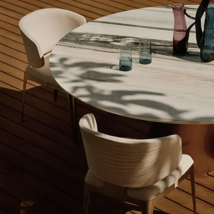 Superior Visionnaire Cameron table built in golden metal with polished marble exhibiting subtle grey veining
